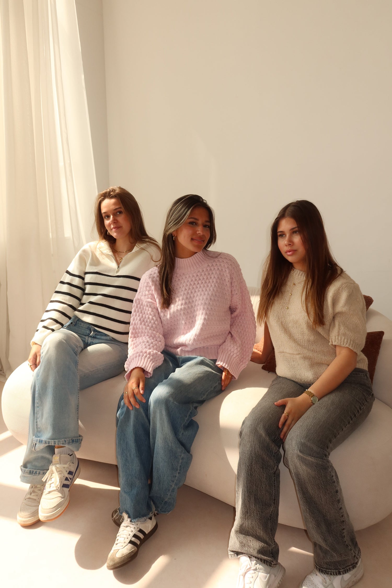 SWEATERS